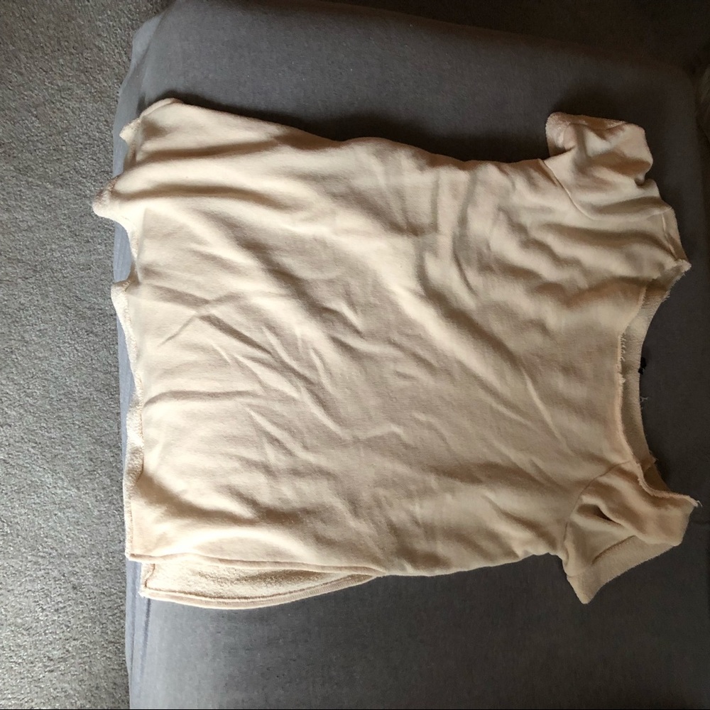 Out from under tunic